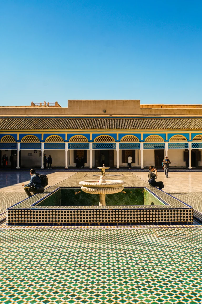 A marble fountain in the center of the tiled Grand Court of Bahia Palace.